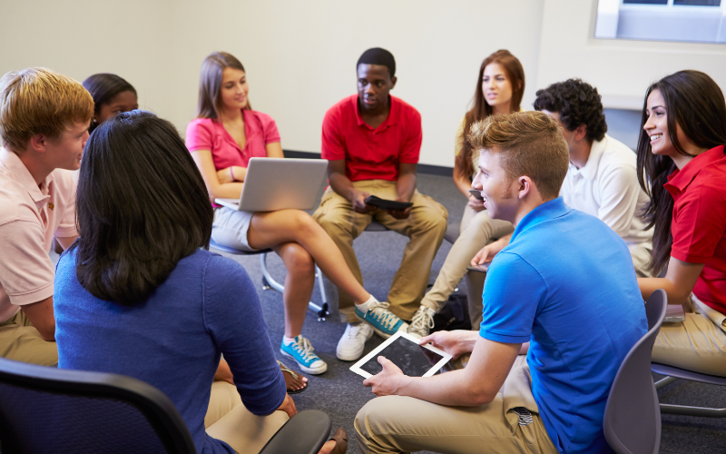 Highland Academy students in a discussion circle during a hybrid homeschool class in Hickory NC